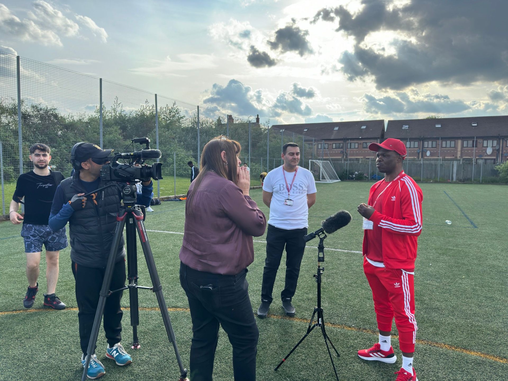 Midlands Community Hub founder with West Midlands Police filming youth feature
