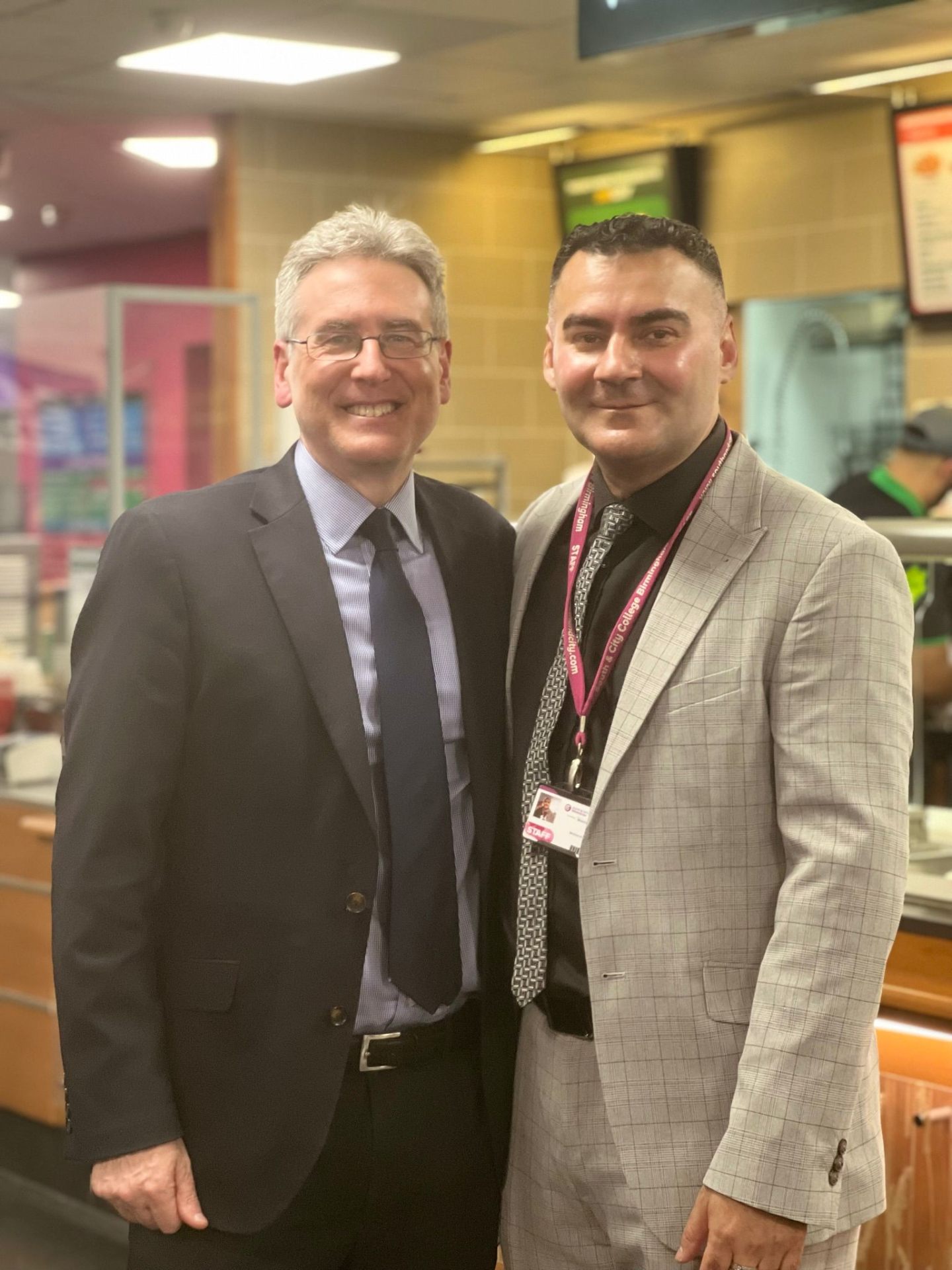 Mohammed Zafran with the Principal of South and City College Birmingham