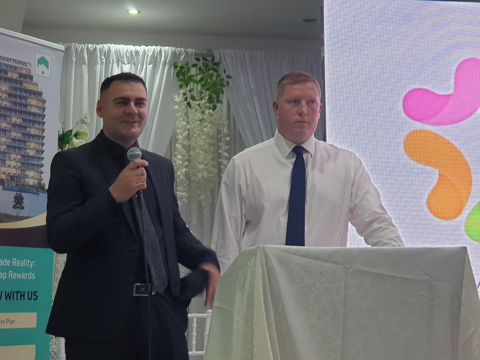 Mohammed Zafran speaking at Haven Homes community event
