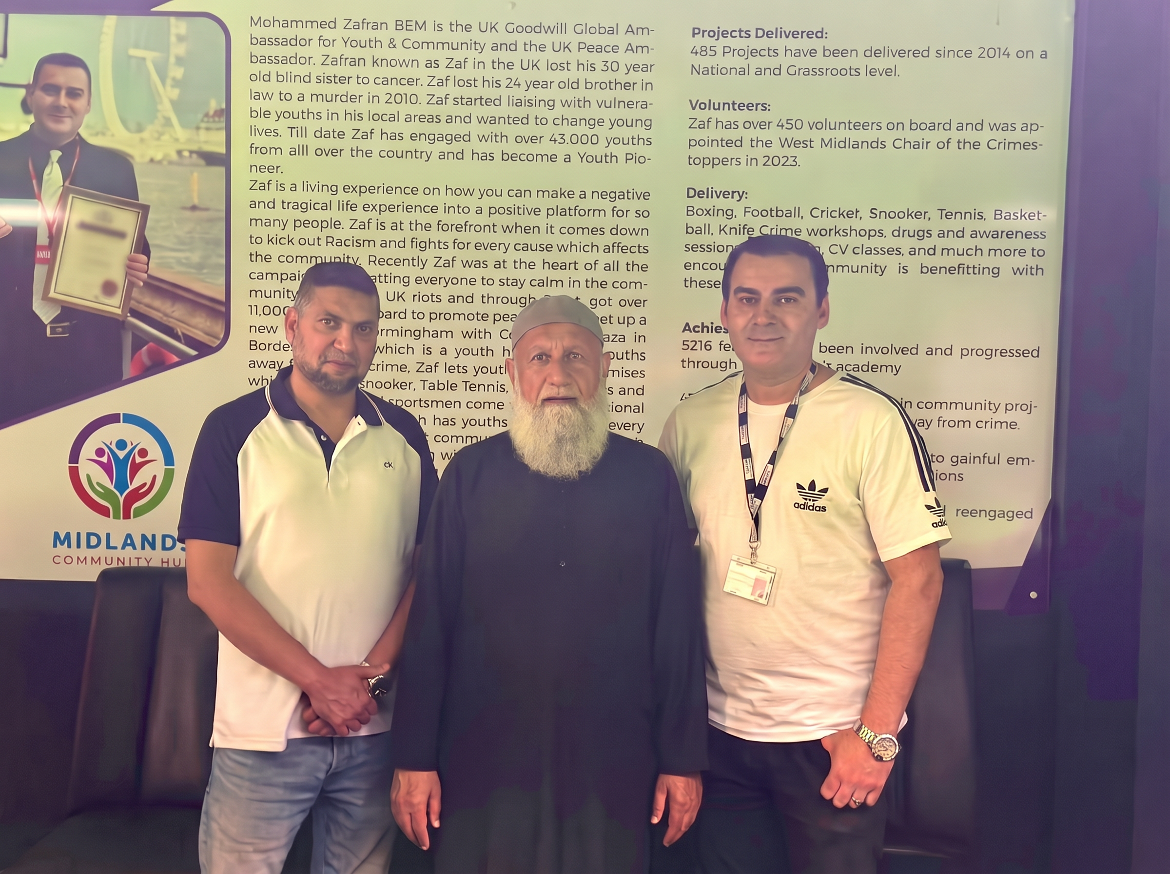 Mohammed Zafran with elders at the Midlands Community Hub ambassador wall