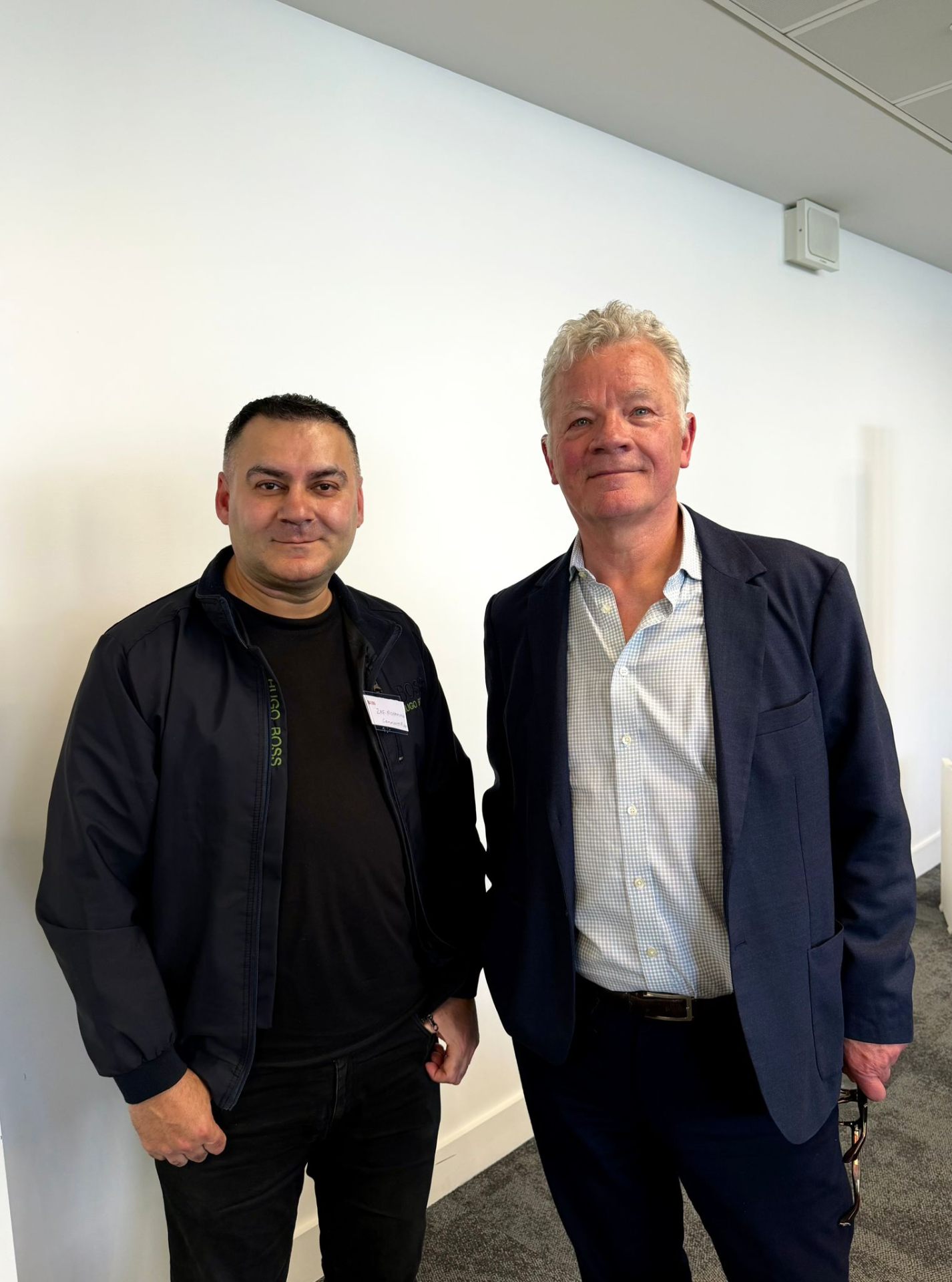 Mohammed Zafran with civic leader at community engagement event