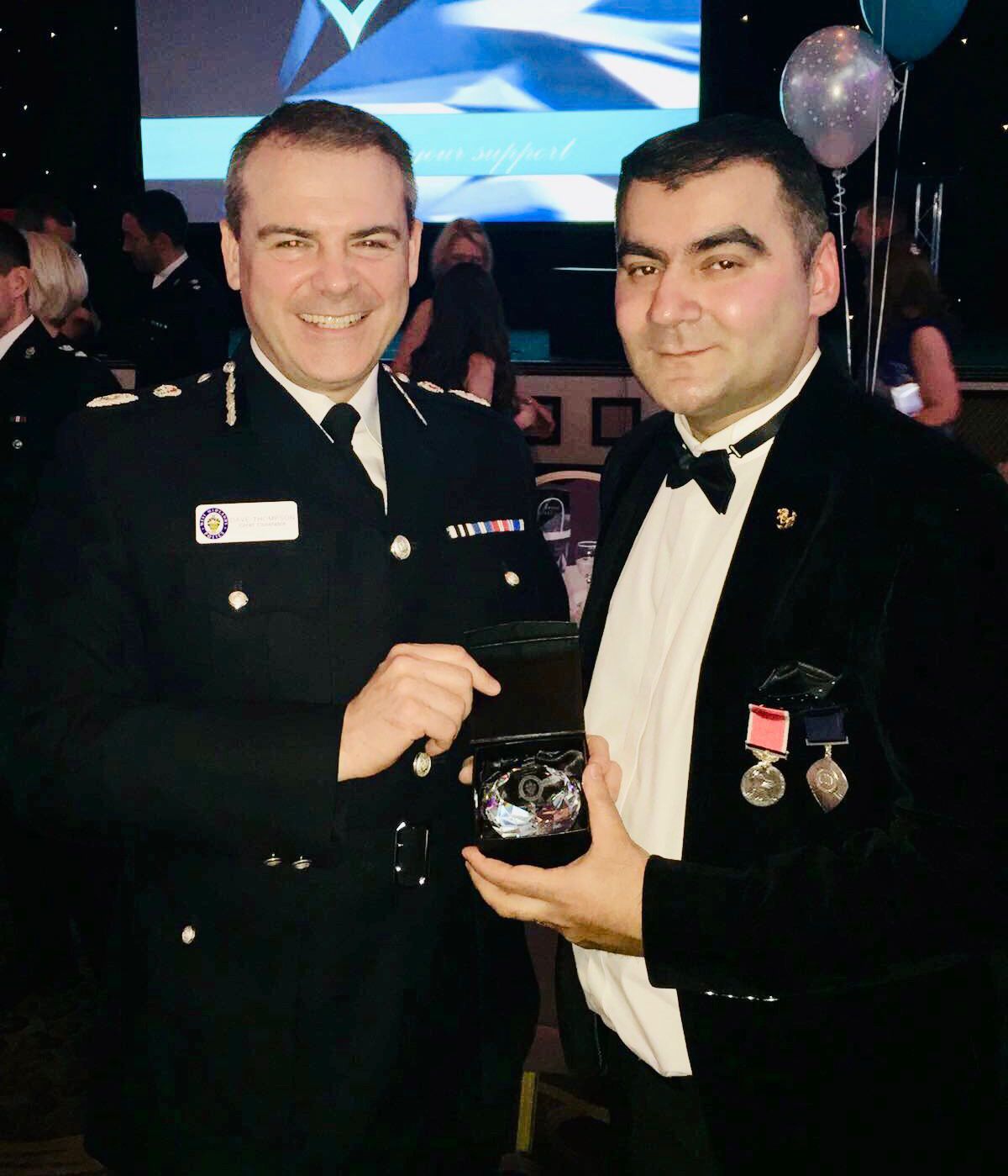 Mohammed Zafran receiving award from West Midlands Police Chief Constable